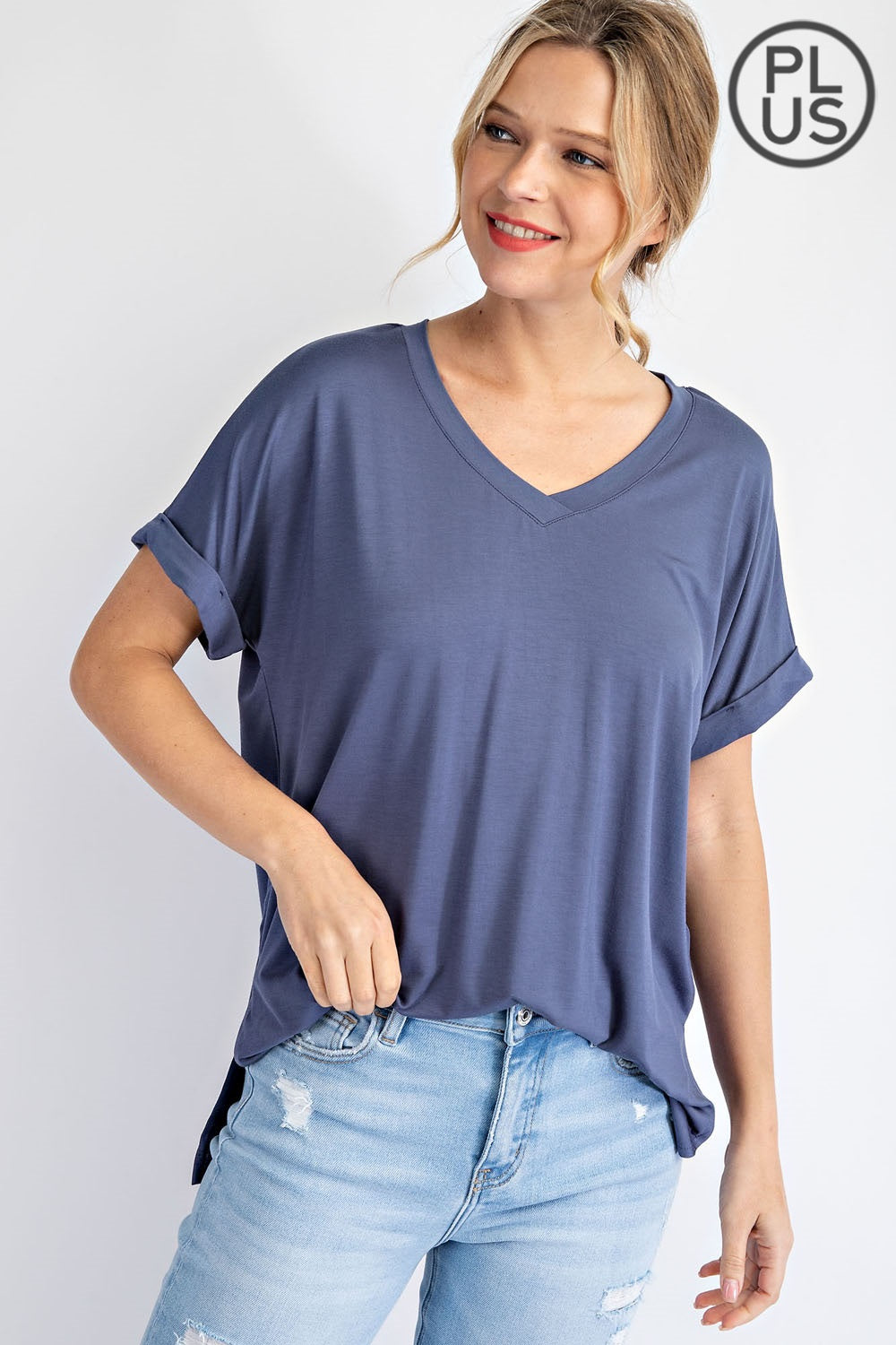 Plus-size V-neck short sleeve Rae Mode top in Latte color
Close-up of back pleat detail and fabric texture
Vintage Denim variant of Rae Mode V-neck plus top, styled with jeans