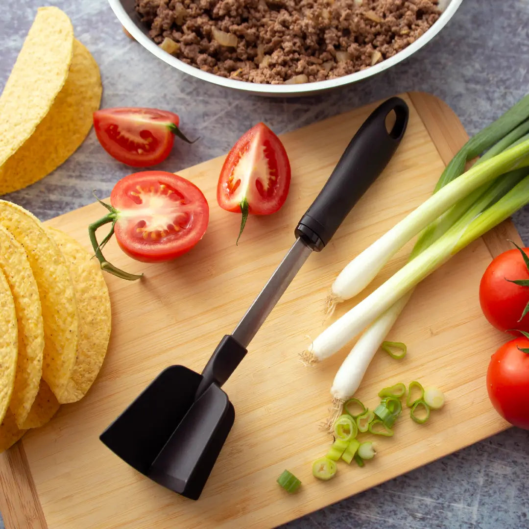 “Rada stainless steel meat chopper with ergonomic black handle”
“Heavy-duty food chopper perfect for vegetables and meat prep”
“Rada meat chopper tool, dishwasher safe, from B7 Boutique”