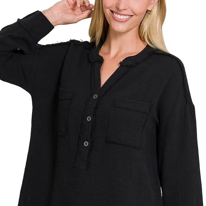 Double gauze henley shirt front view with 3/4 button neckline
Close-up of washed gauze cotton texture and buttons
Detail of hem and silhouette of relaxed Zenana henley shirt