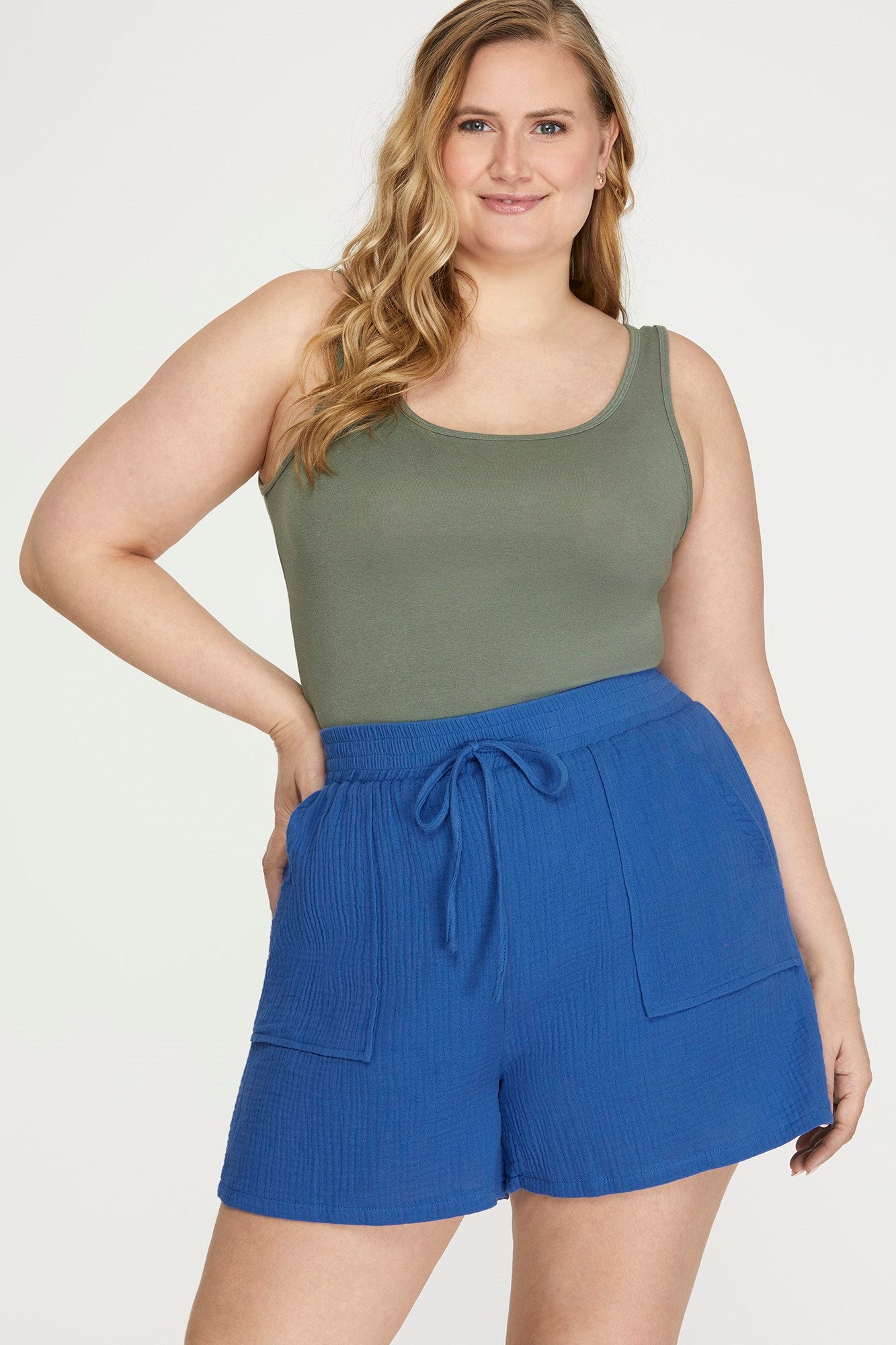 “Plus size woven shorts with front tie and pockets”
“High-waisted plus shorts by She & Sky”
“Relaxed fit woven shorts with elastic waistband and tie detail”