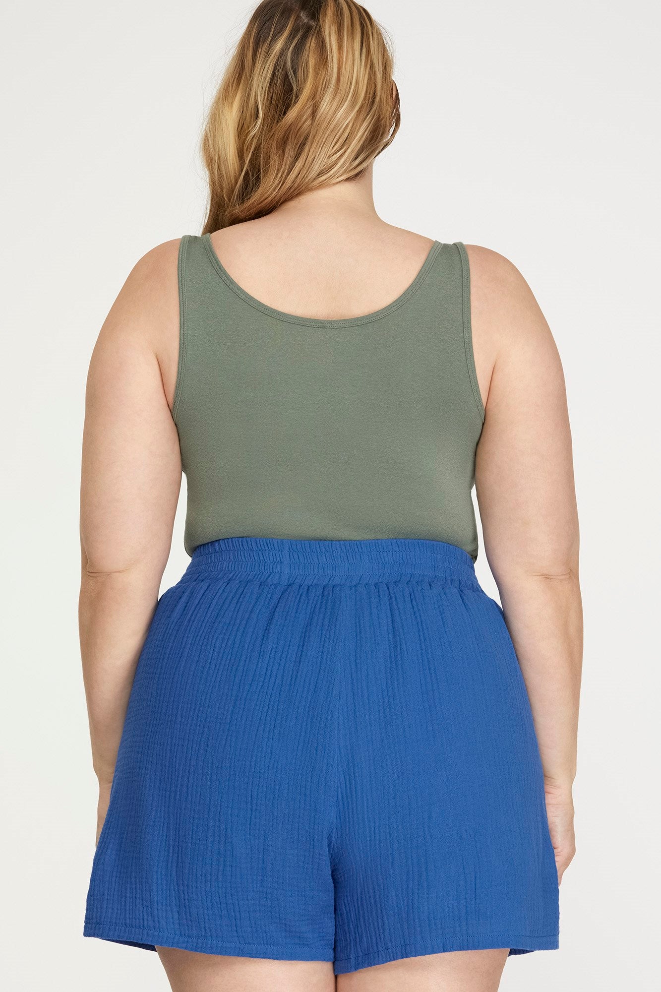 “Plus size woven shorts with front tie and pockets”
“High-waisted plus shorts by She & Sky”
“Relaxed fit woven shorts with elastic waistband and tie detail”