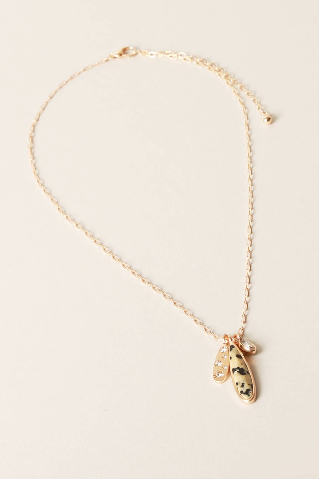 “Semi‑precious stone pendant necklace with burr setting”
“Natural gemstone burr-set pendant on fine chain”
“Minimalist burr-set stone necklace – B7 Boutique”