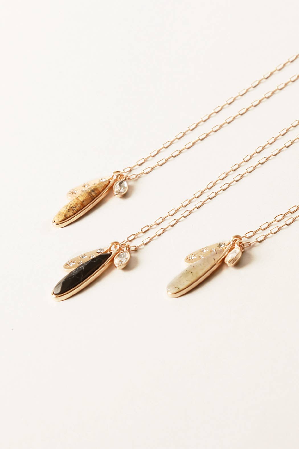 “Semi‑precious stone pendant necklace with burr setting”
“Natural gemstone burr-set pendant on fine chain”
“Minimalist burr-set stone necklace – B7 Boutique”