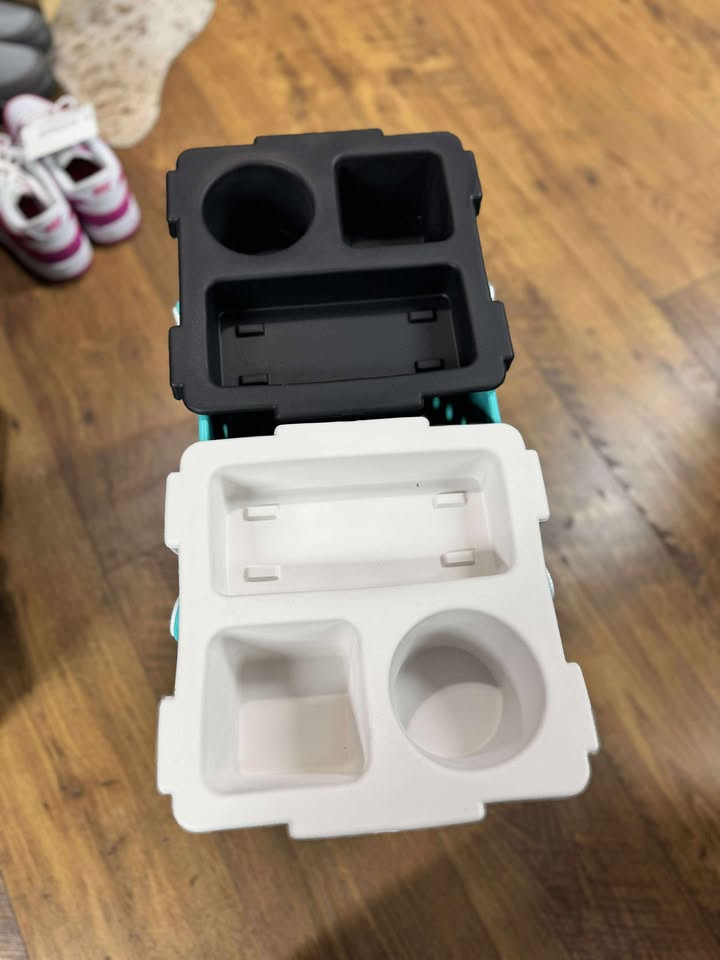 “Top o’ the Bogg To Ya topper tray in mushroom color sitting atop Original Bogg Bag”
“Tray view with built-in cup holders and tray within a tray design”
“Close-up of topper tray edges and EVA material texture”