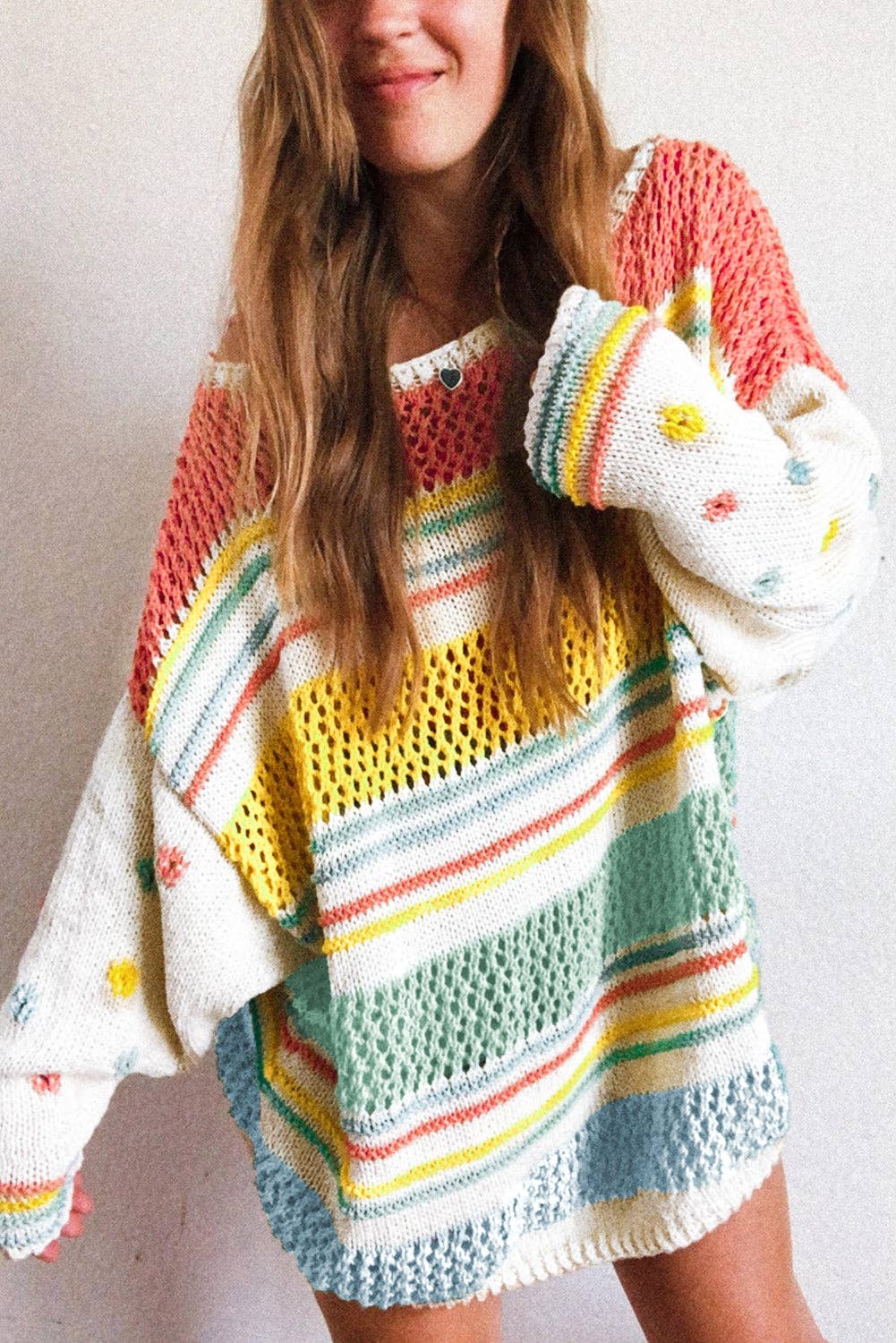 “Multicolor hollow-striped knit sweater with contrast sleeves”
“Lightweight drop-shoulder striped pullover with bright sleeves”
“Layered hollow-knit sweater featuring bold multicolor stripes – B7 Boutique”