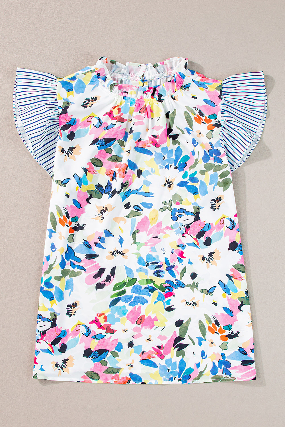 “Light blue floral striped blouse with ruffled sleeves”
“Soft floral and stripe print puff sleeve top”
“Floral oversized blouse with ruffle detail”