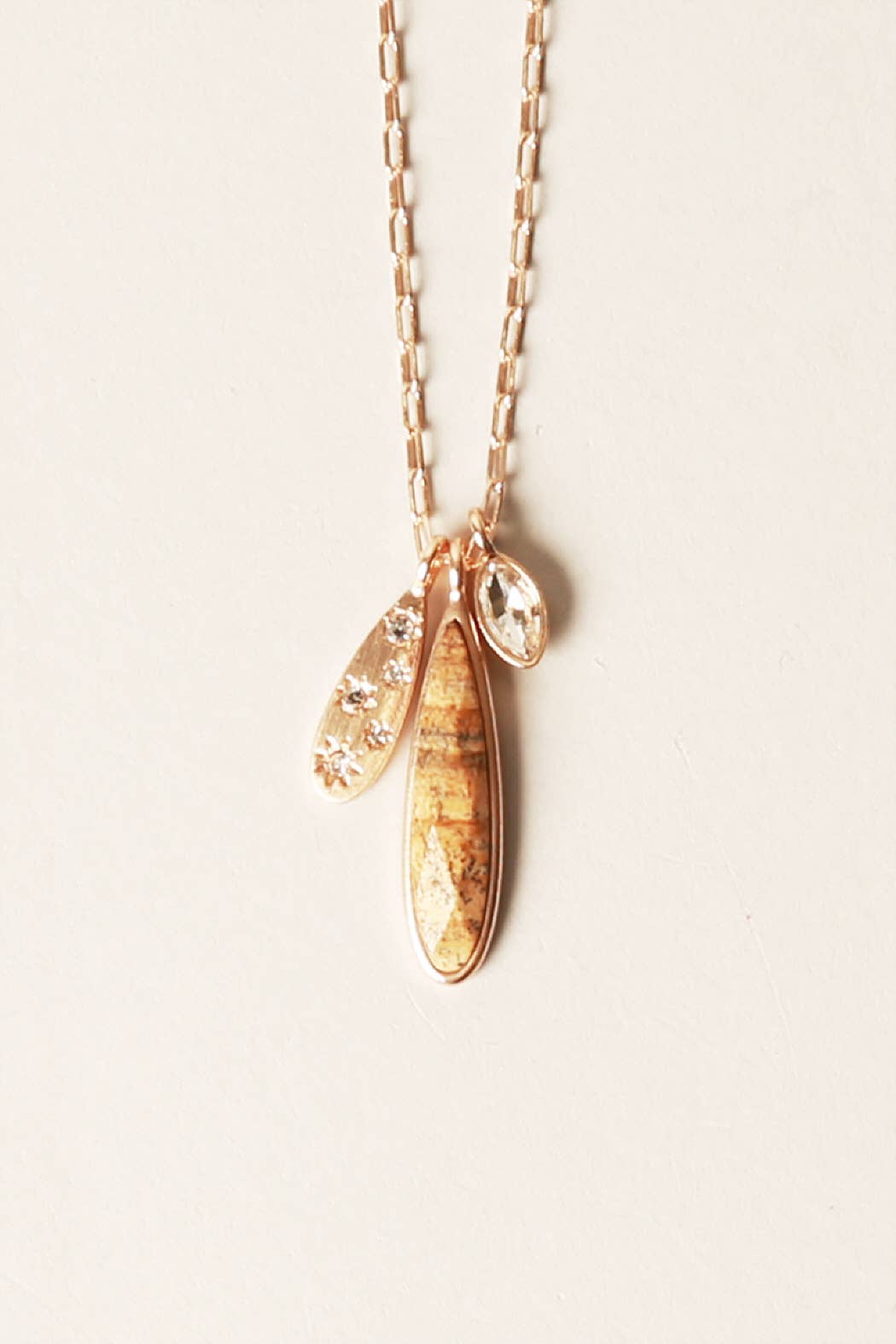 “Semi‑precious stone pendant necklace with burr setting”
“Natural gemstone burr-set pendant on fine chain”
“Minimalist burr-set stone necklace – B7 Boutique”