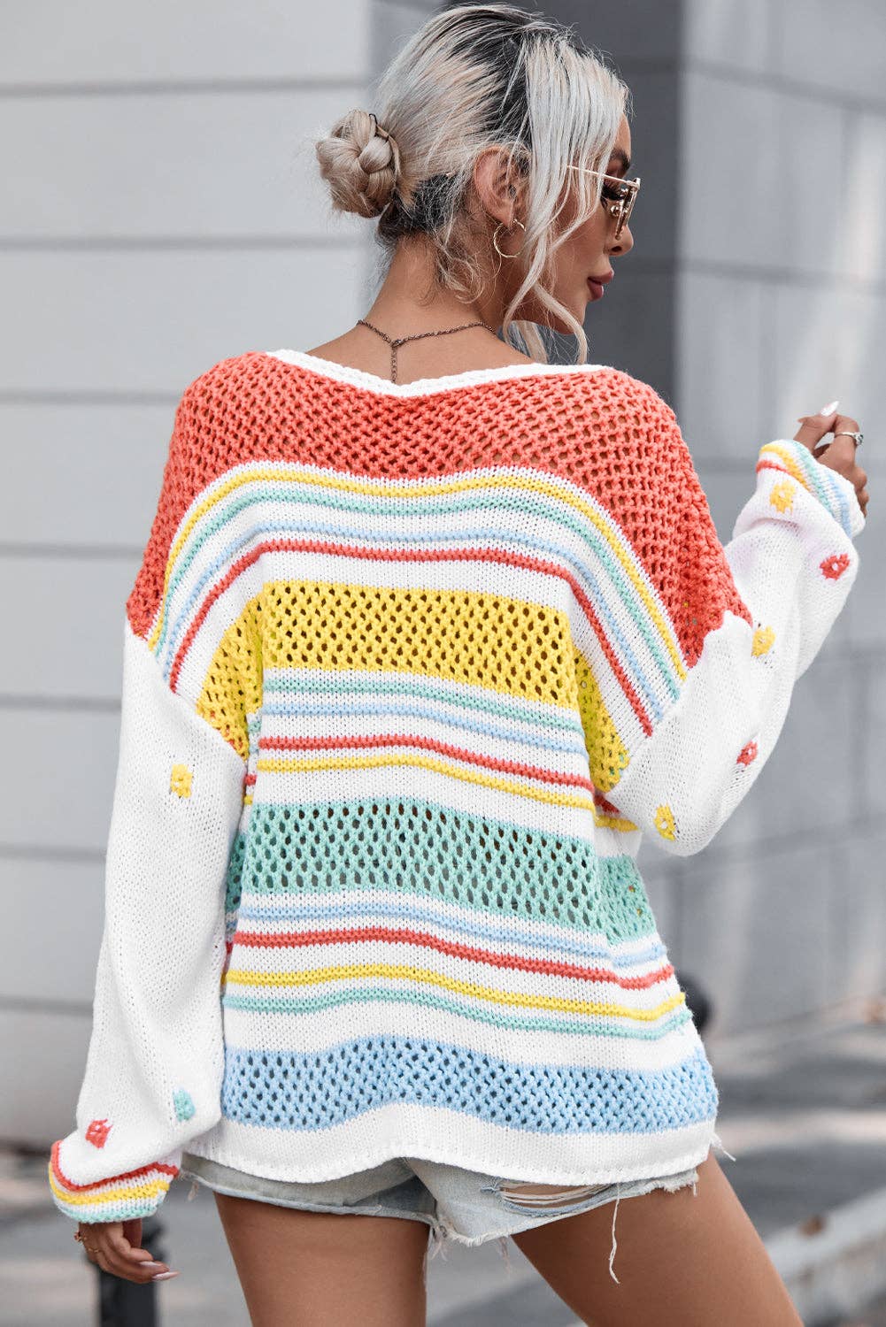 “Multicolor hollow-striped knit sweater with contrast sleeves”
“Lightweight drop-shoulder striped pullover with bright sleeves”
“Layered hollow-knit sweater featuring bold multicolor stripes – B7 Boutique”