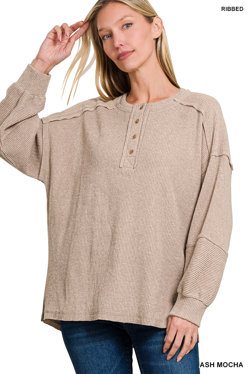 “Zenana Ribbed Brushed Melange Hacci Henley Sweater front view”
“Close-up of ribbed melange knit texture and Henley buttons”
“Sweater relaxed fit styled over jeans on model”