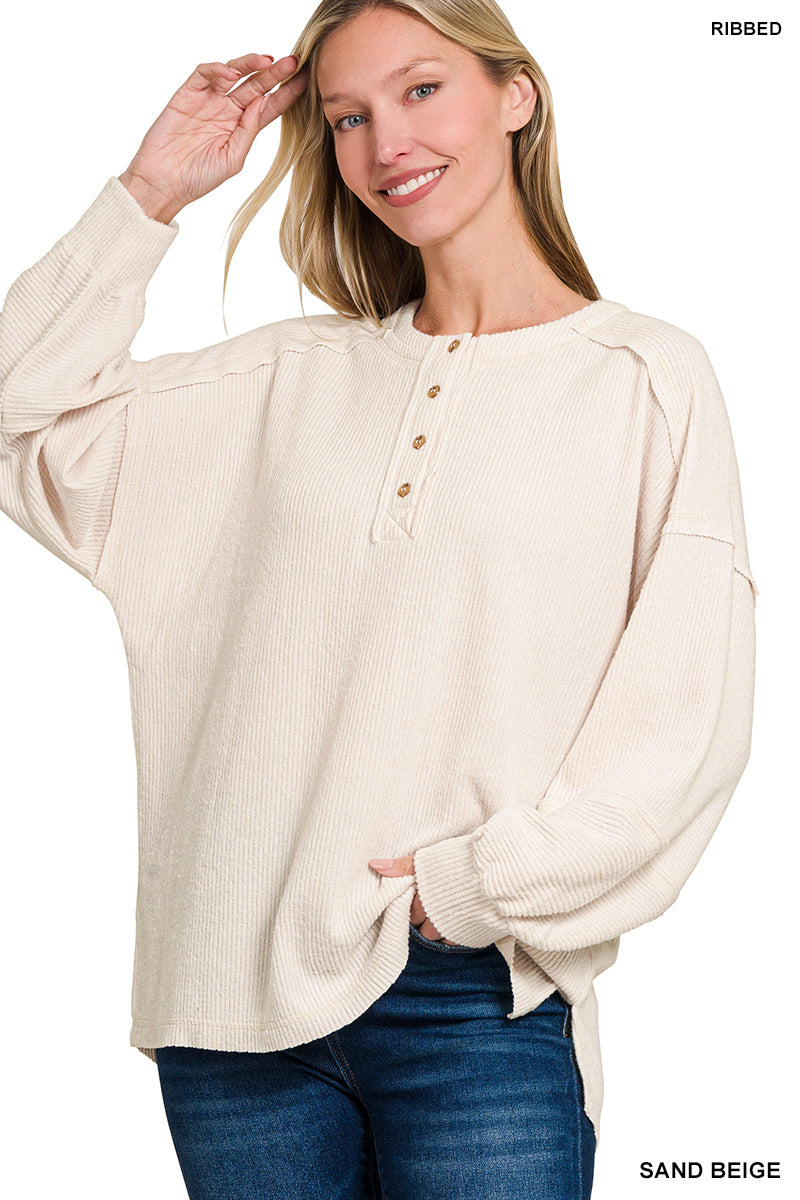 “Zenana Ribbed Brushed Melange Hacci Henley Sweater front view”
“Close-up of ribbed melange knit texture and Henley buttons”
“Sweater relaxed fit styled over jeans on model”