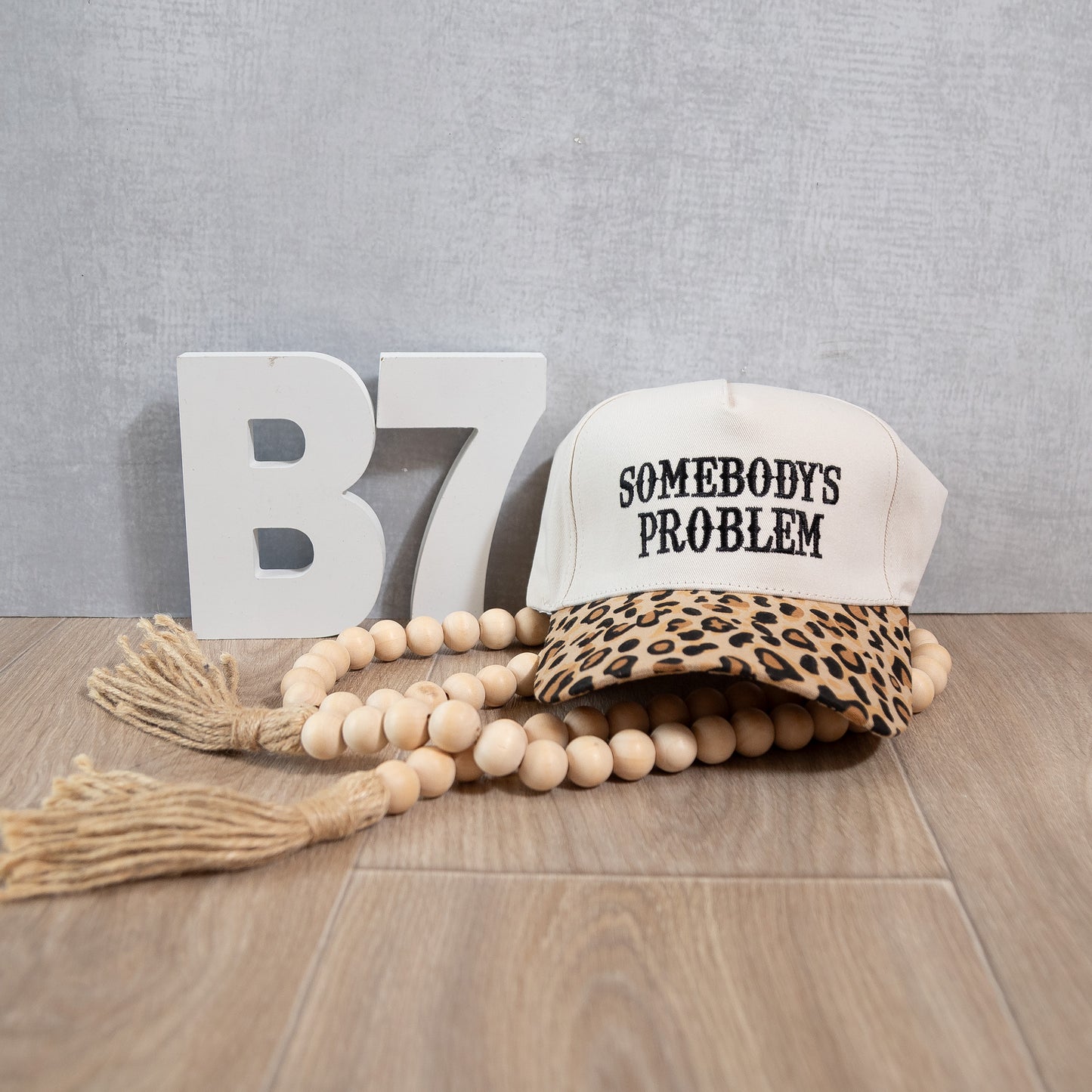 Somebody’s Problem Embroidered Trucker Hat – Bold Statement Western Cap