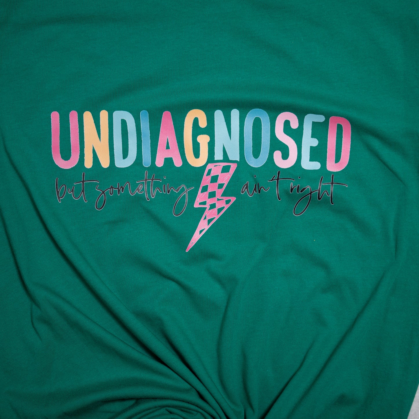Undiagnosed Lightning Bolt Graphic Tee – Colorful Empowerment T-Shirt