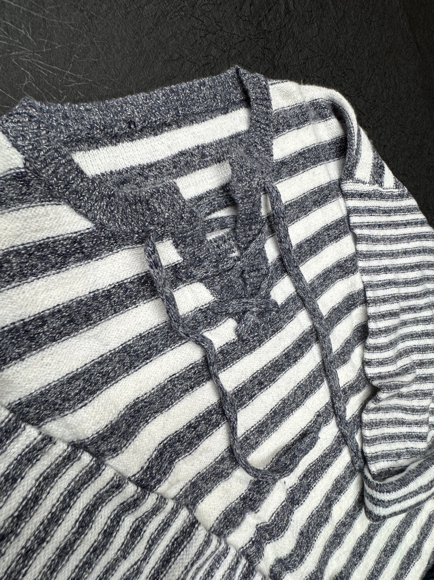 “Blue striped knit sweater with adjustable tie-back”
“Cozy blue and white striped sweater with back-tie detail”
“Lightweight long-sleeve tie-up sweater in blue stripes – B7 Boutique”