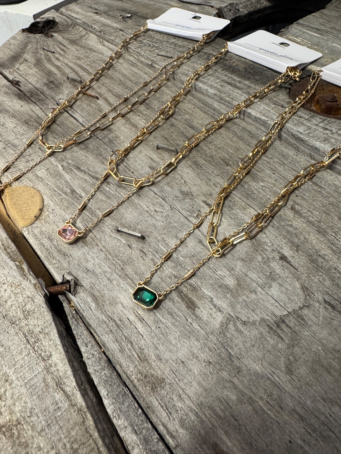 “Dainty layered gem necklace set for women”
“Gold plated layered necklace with small gemstone chain”
“Minimalist sparkly gemstone layering necklace”