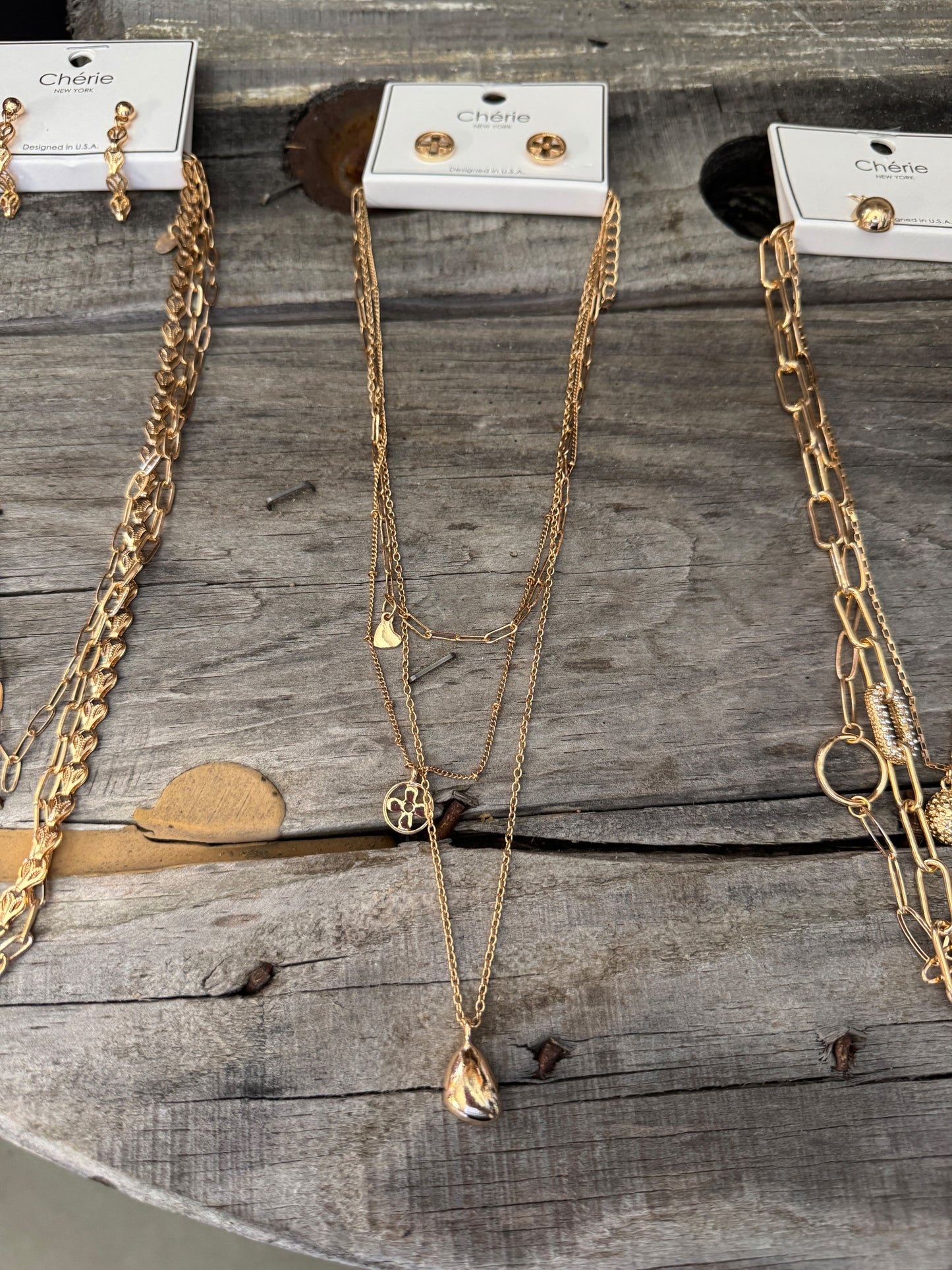 “Layers for Days necklace and earring set – Tear Drop style”
“Layered necklace with matching Leafy Chain earrings”
“Big Paper Clip layered necklace and earring duo, no-tarnish”