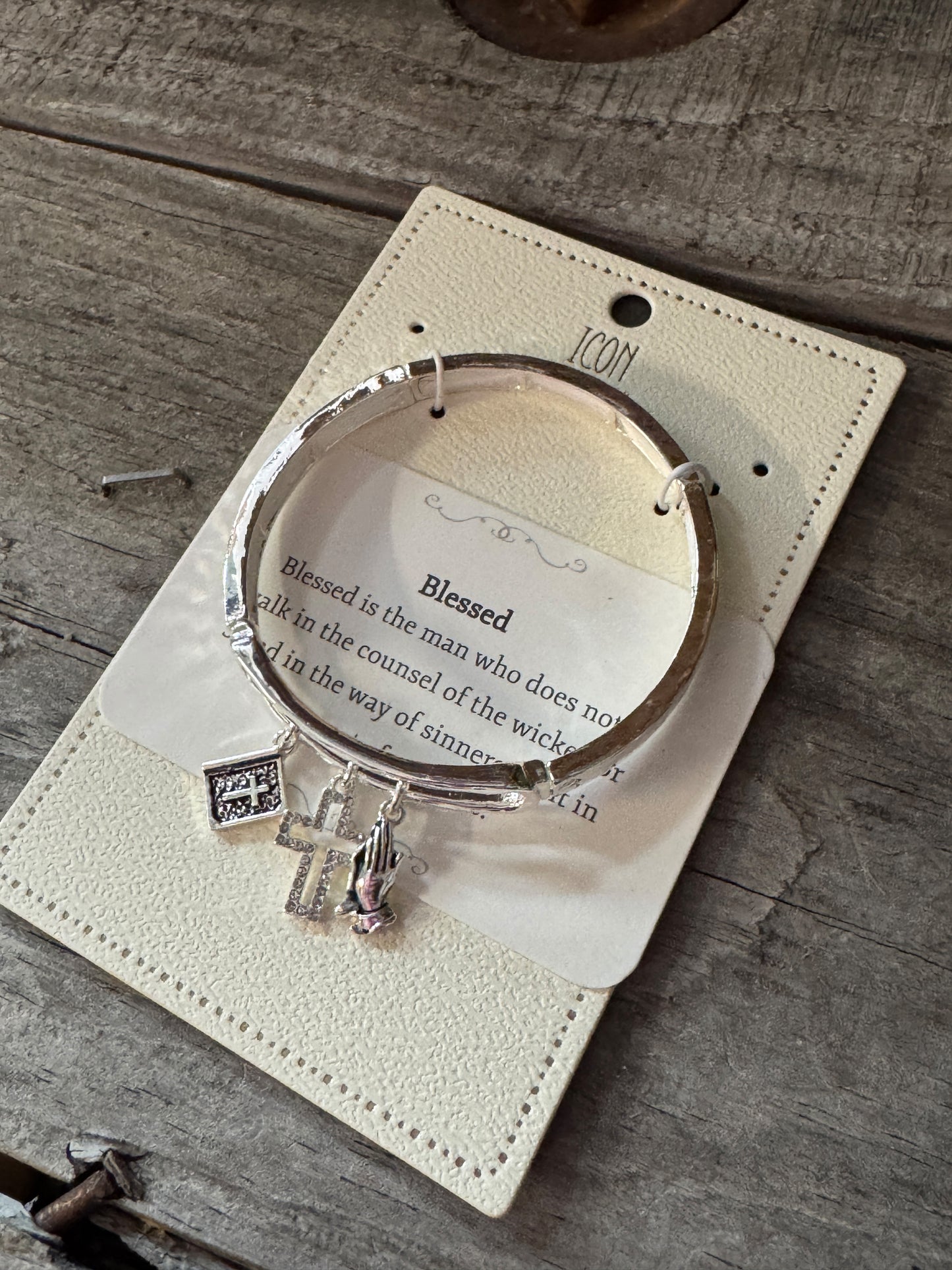 Faithful Grace silver charm bracelet with Bible, praying hands, and cross
Inspirational faith charm bracelet adjustable fit
Meaningful religious jewelry from B7 Boutique
