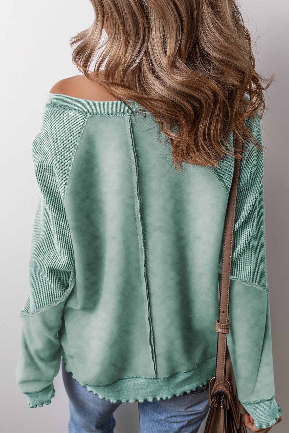 “Mineral blue waffle knit sweatshirt with patchwork raglan sleeves”
“Waffle texture sweatshirt with exposed seams – relaxed fit”
“Cozy patchwork raglan sleeve pullover in mineral blue”