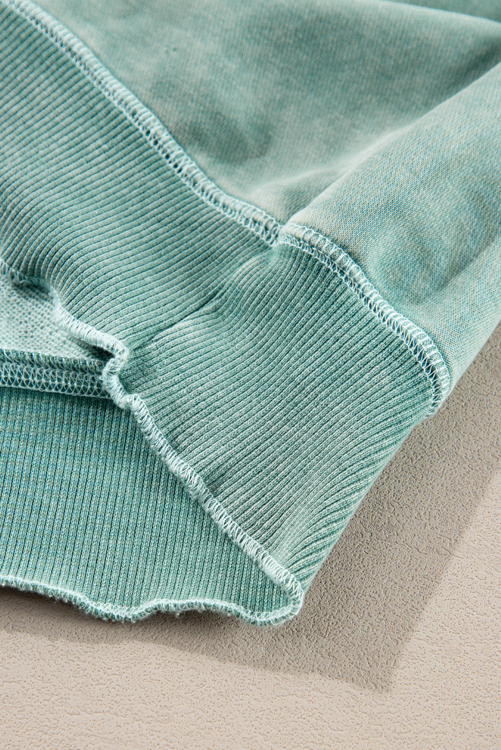 “Mineral blue waffle knit sweatshirt with patchwork raglan sleeves”
“Waffle texture sweatshirt with exposed seams – relaxed fit”
“Cozy patchwork raglan sleeve pullover in mineral blue”