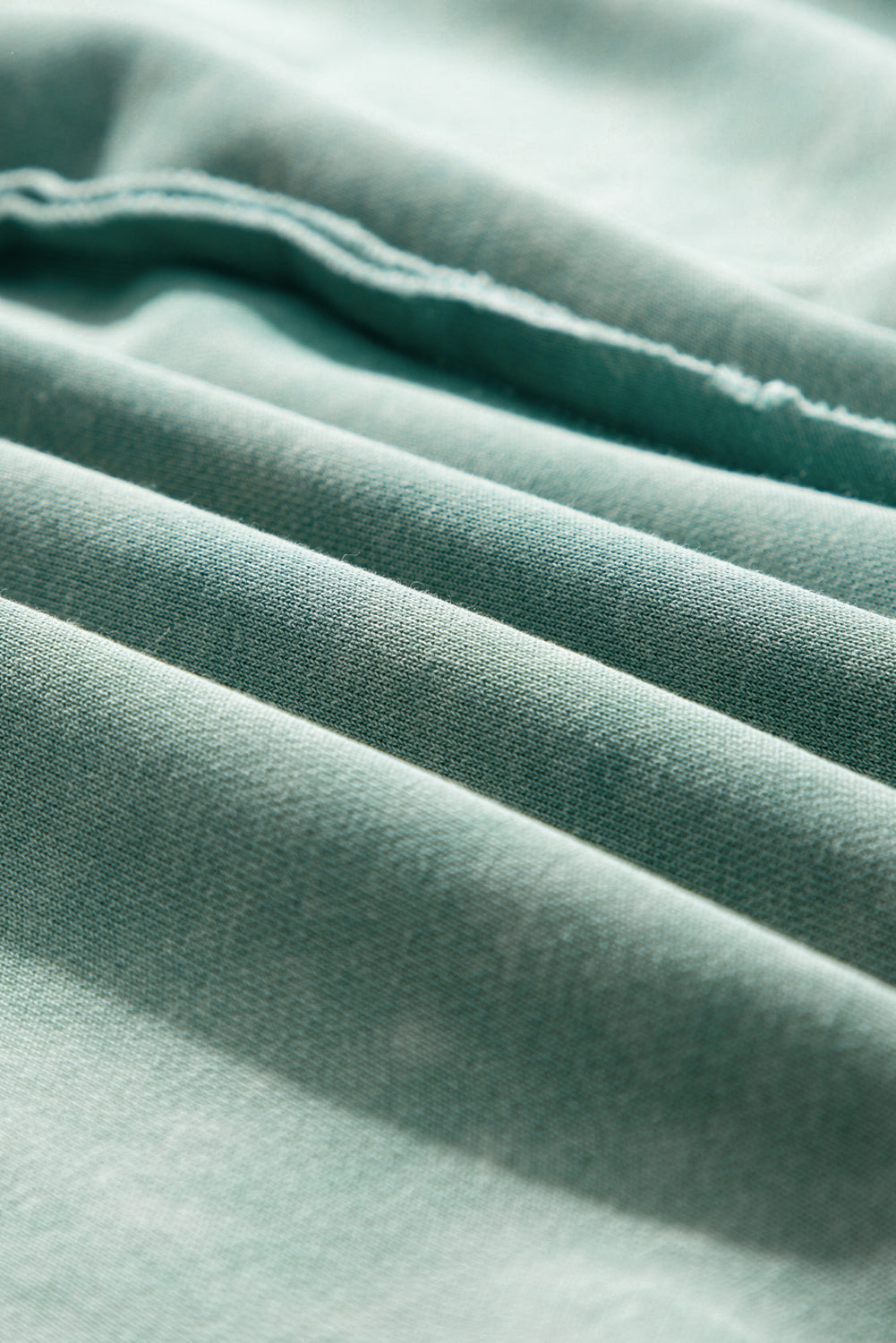 “Mineral blue waffle knit sweatshirt with patchwork raglan sleeves”
“Waffle texture sweatshirt with exposed seams – relaxed fit”
“Cozy patchwork raglan sleeve pullover in mineral blue”