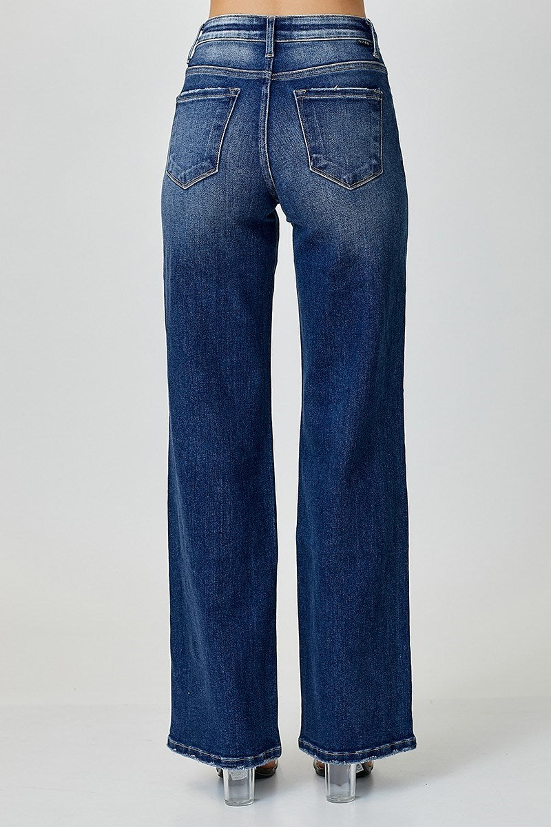 “Risen mid-rise straight jeans front view, light/medium wash”
“Close-up of stretch denim texture and seams on straight leg”
“Back view showing straight cut silhouette and mid-rise waistband”