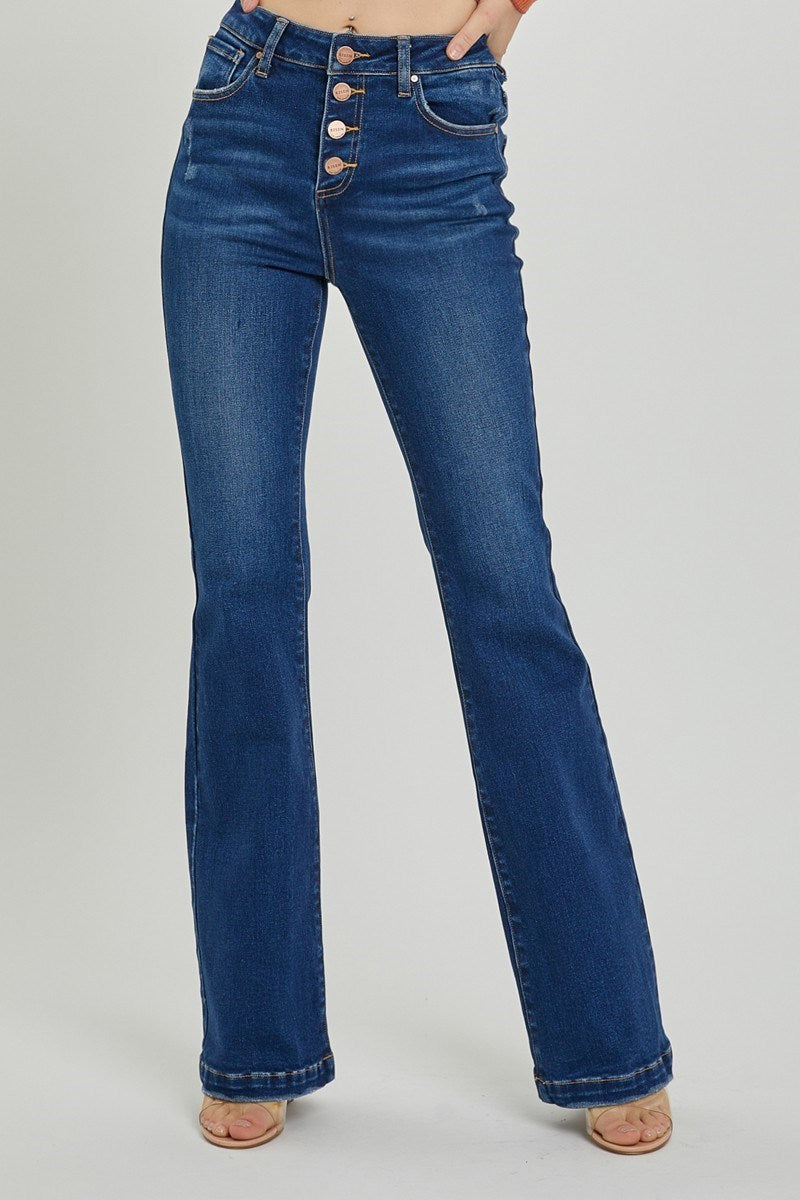 Front view of Risen high-rise bootcut jeans in light wash
Close-up of the button fly and denim texture
Back view showing flare leg and fit on model