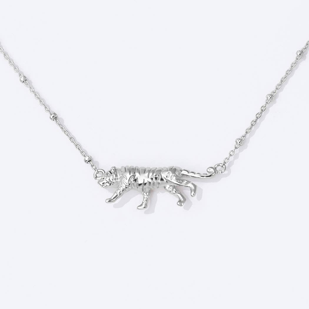 “Gold-dipped tiger figurine pendant necklace”
“Fierce tiger charm necklace in gold on brass chain”
“Handmade tiger pendant—symbol of power and elegance”