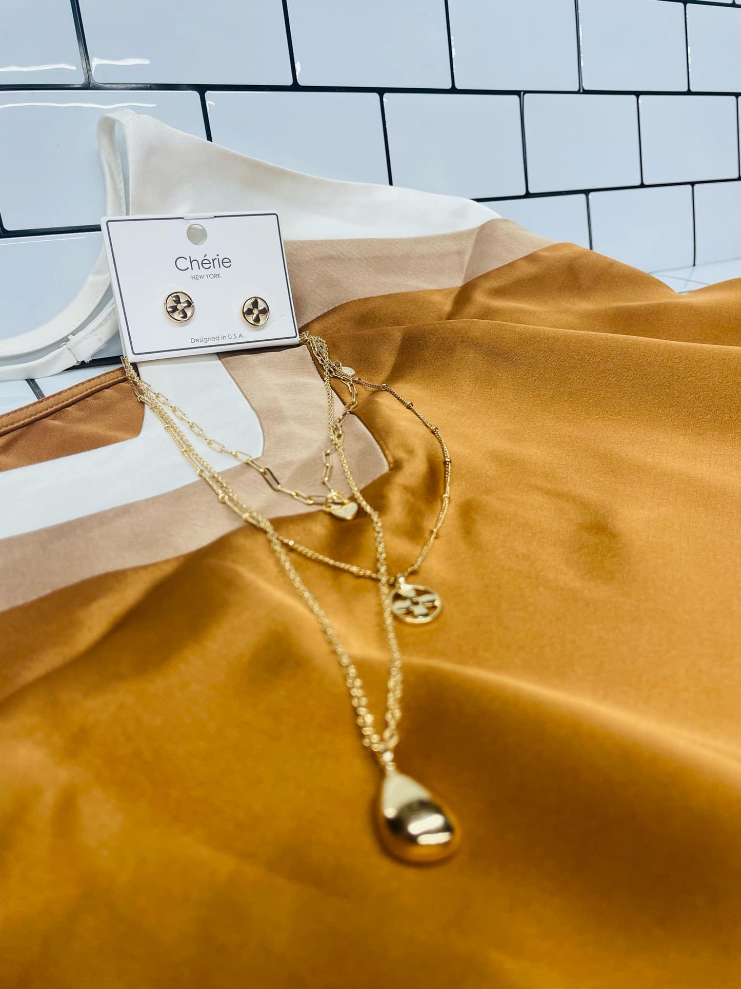 “Layers for Days necklace and earring set – Tear Drop style”
“Layered necklace with matching Leafy Chain earrings”
“Big Paper Clip layered necklace and earring duo, no-tarnish”