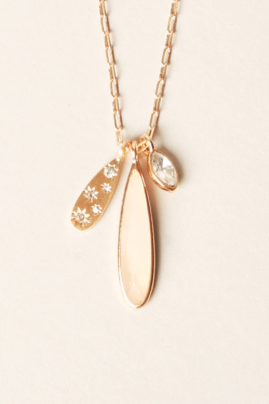 “Semi‑precious stone pendant necklace with burr setting”
“Natural gemstone burr-set pendant on fine chain”
“Minimalist burr-set stone necklace – B7 Boutique”