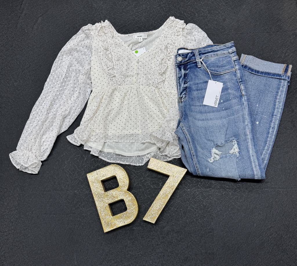 A Swiss top with polka dots displayed alongside a pair of blue denim jeans, with the brand 'Blu Pepper' visible.
