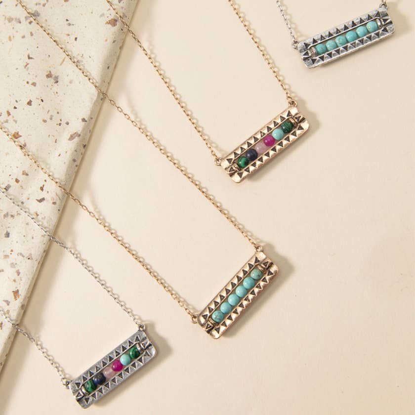 “Stone beaded bar drop pendant necklace”
“Minimalist natural stone bar necklace on delicate chain”
“Layer-ready beaded bar drop pendant at B7 Boutique”