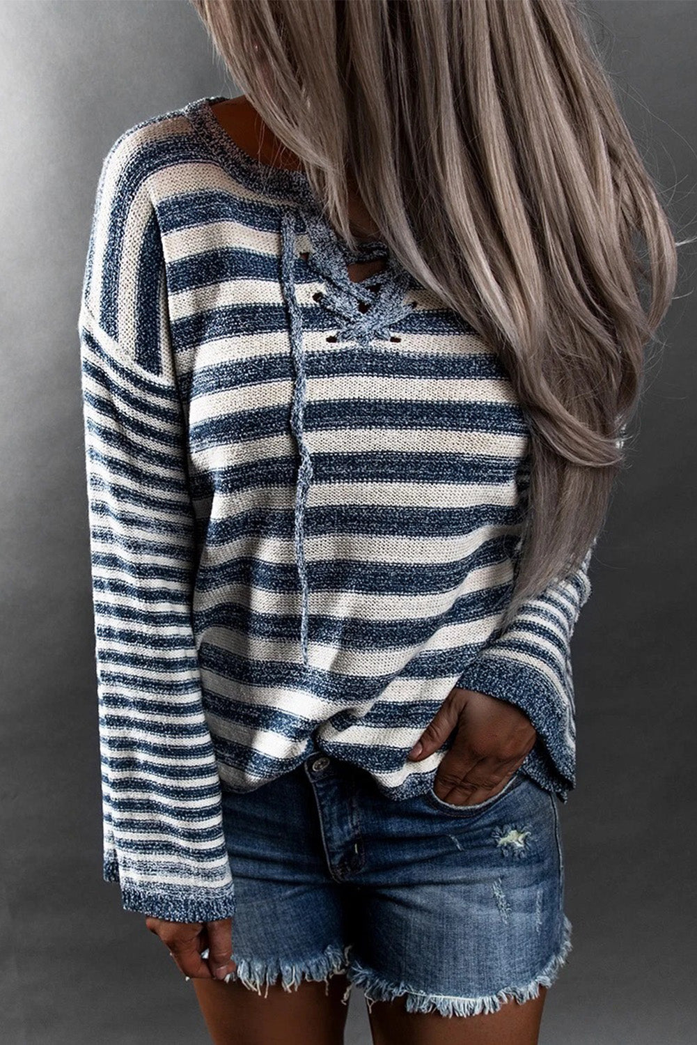 “Blue striped knit sweater with adjustable tie-back”
“Cozy blue and white striped sweater with back-tie detail”
“Lightweight long-sleeve tie-up sweater in blue stripes – B7 Boutique”