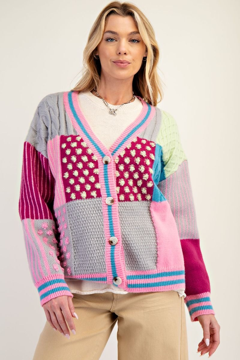 “Easel patchwork knit cardigan with colorful panels”
“Cozy patchwork beauty cardigan – relaxed fit and dropped shoulders”
“Button-front boho sweater with playful multicolor patchwork design”