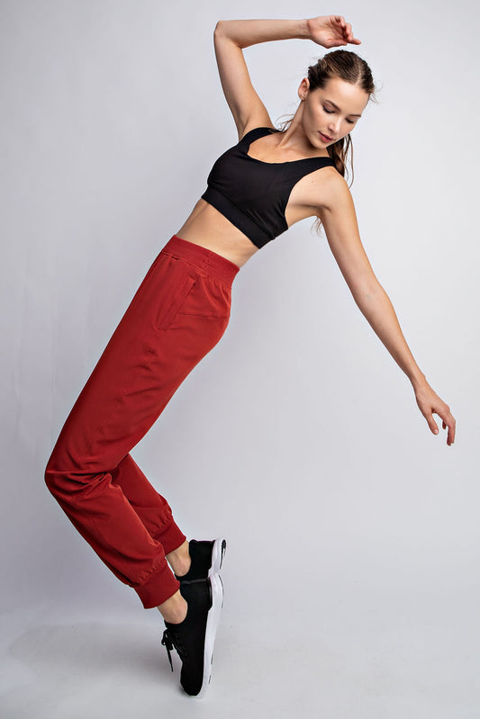 “Rae Mode Oxford St. Woven Dance Studio Pants”
“Mid-rise full-length woven pants for women”
“Black athletic woven pants with studio-to-street style”
