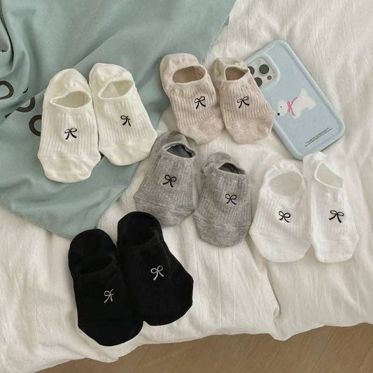 “Ladies knit boat socks with bow accent”
“Cute cartoon bow socks for women”
“Cozy knit socks with bow detail in low-cut style”