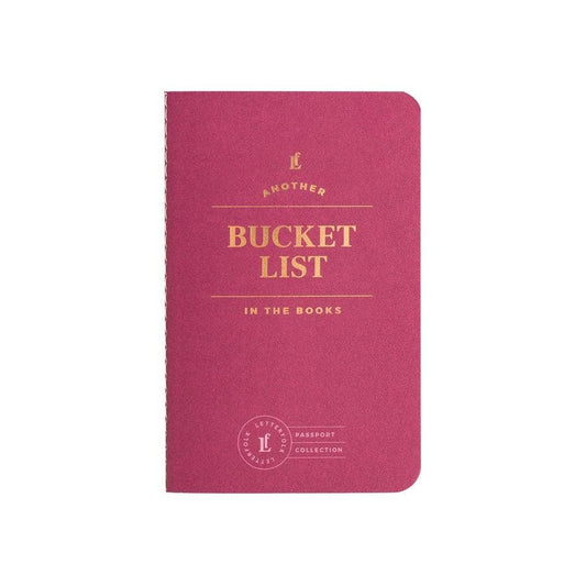 "Bucket List Passport notebook for travel dreams"

"Mini adventure journal in passport style"

"Small navy goal planner from B7 Boutique"