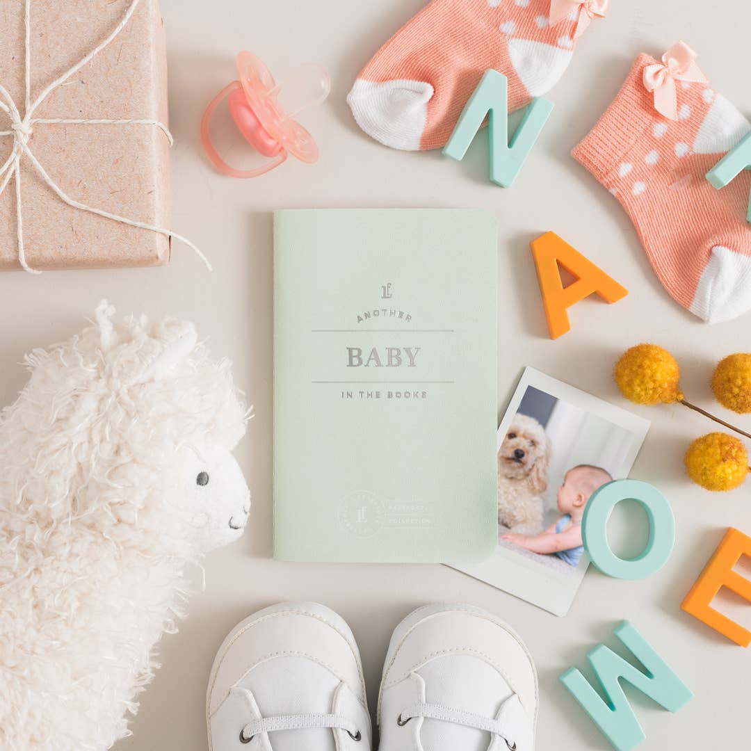 "Baby Passport milestone tracker for first year"

"Pocket-sized baby journal with cute prompts"

"Mini baby memory book in soft neutral design"
