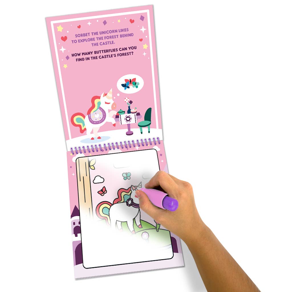 Water Magic “Princess & Unicorn” activity book showing closed cover

Child using the scented water pen to reveal hidden princess-and-unicorn illustrations

Close-up of the water pen revealing colorful details on scene boards

Kit contents: four scene boards with brush and packaging
