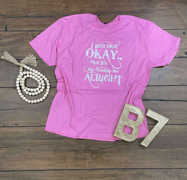 “I Am Not Okay But It’s All Gonna Be Alright” Graphic Tee – Uplifting & Relatable Everyday Comfort 🌤️