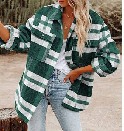 Women’s plaid flannel shirt jacket oversized shacket front view

Close-up of plaid pattern, collar and chest pockets on flannel shacket

Back view / side view showing relaxed silhouette and button cuffs