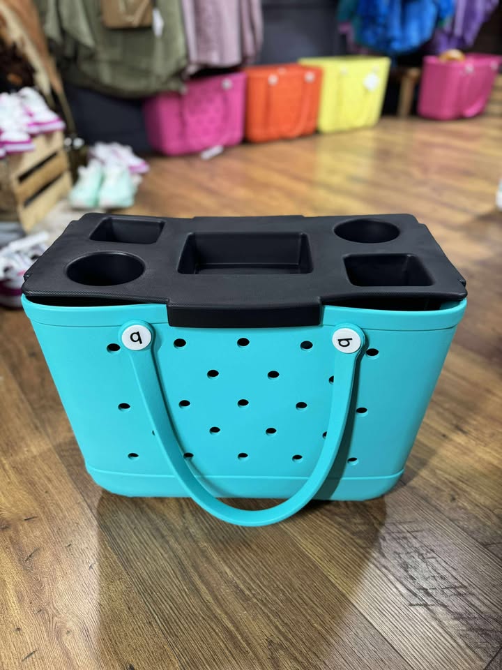 “Top o’ the Bogg To Ya topper tray in mushroom color sitting atop Original Bogg Bag”

“Tray view with built-in cup holders and tray within a tray design”

“Close-up of topper tray edges and EVA material texture”