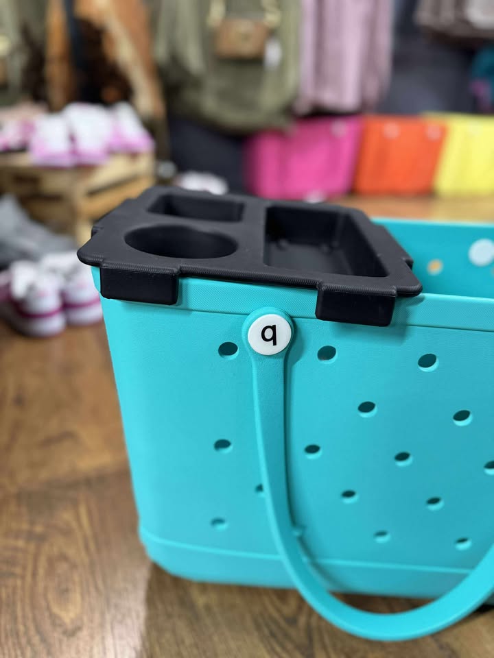 “Top o’ the Bogg To Ya topper tray in mushroom color sitting atop Original Bogg Bag”

“Tray view with built-in cup holders and tray within a tray design”

“Close-up of topper tray edges and EVA material texture”