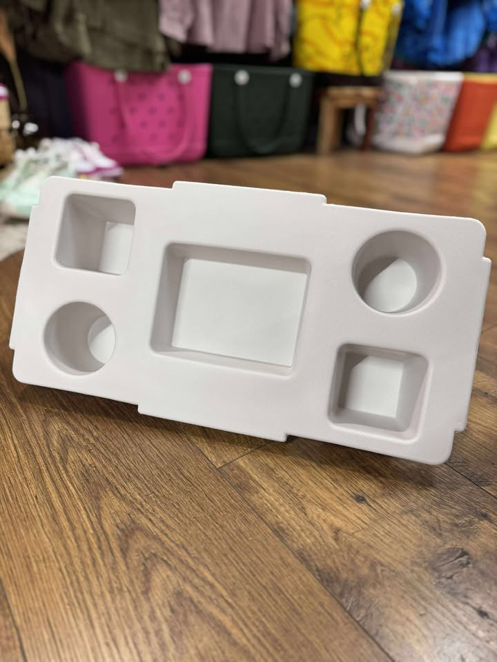 “Top o’ the Bogg To Ya topper tray in mushroom color sitting atop Original Bogg Bag”

“Tray view with built-in cup holders and tray within a tray design”

“Close-up of topper tray edges and EVA material texture”