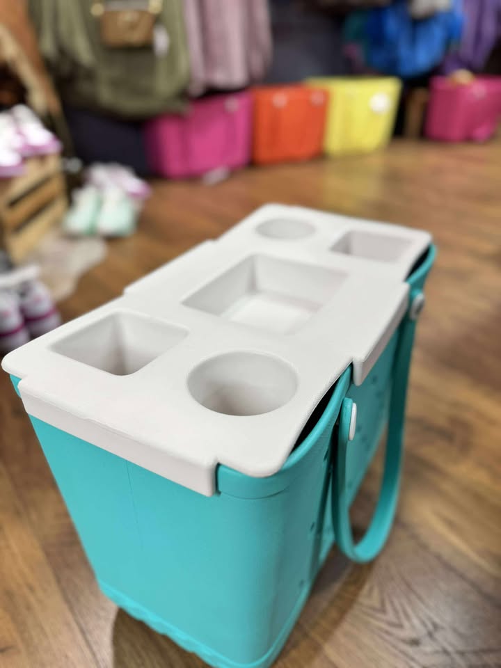 “Top o’ the Bogg To Ya topper tray in mushroom color sitting atop Original Bogg Bag”

“Tray view with built-in cup holders and tray within a tray design”

“Close-up of topper tray edges and EVA material texture”