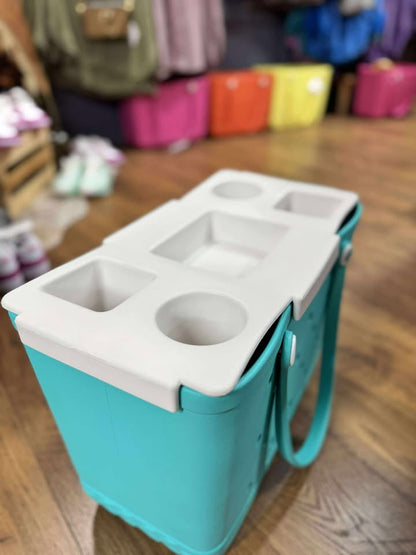 “Top o’ the Bogg To Ya topper tray in mushroom color sitting atop Original Bogg Bag”

“Tray view with built-in cup holders and tray within a tray design”

“Close-up of topper tray edges and EVA material texture”