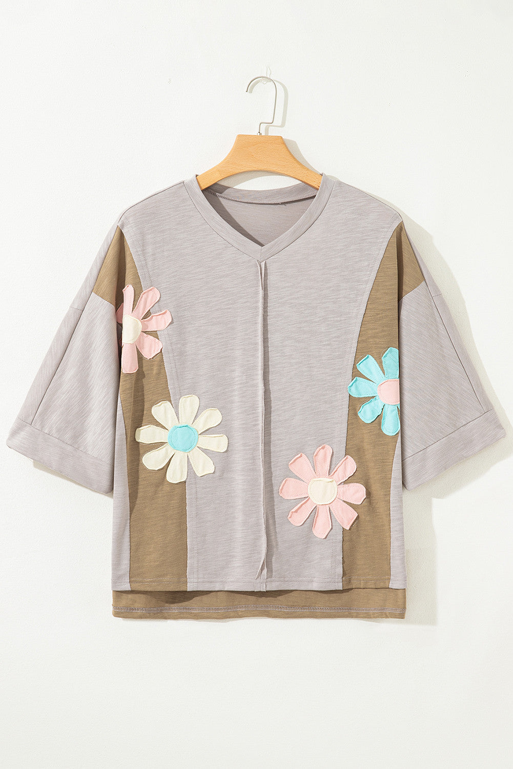 Bloom & Chill Oversized Tee – Green Floral Patch Exposed Seam Relaxed Fit Top