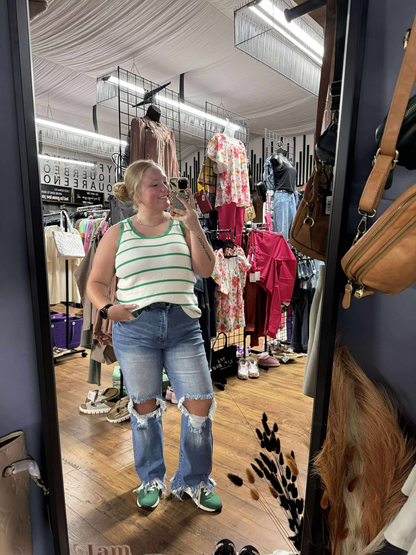 “Bright green striped sleeveless sweater with scalloped edge – B7 Boutique”
“U-neck knit tank with bold stripes and feminine trim”
“Green and white striped boutique sweater tank”