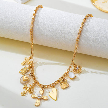 Faith & Fancy Charm Necklace | Vintage Gold Cross & Heart Necklace