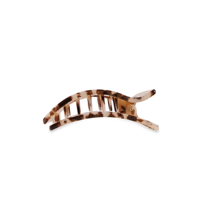 “Small flat TELETIES hair clip on white background”

“No-snag claw clip for thin to medium hair”

“Flat-back TELETIES clip perfect for driving or lounging”