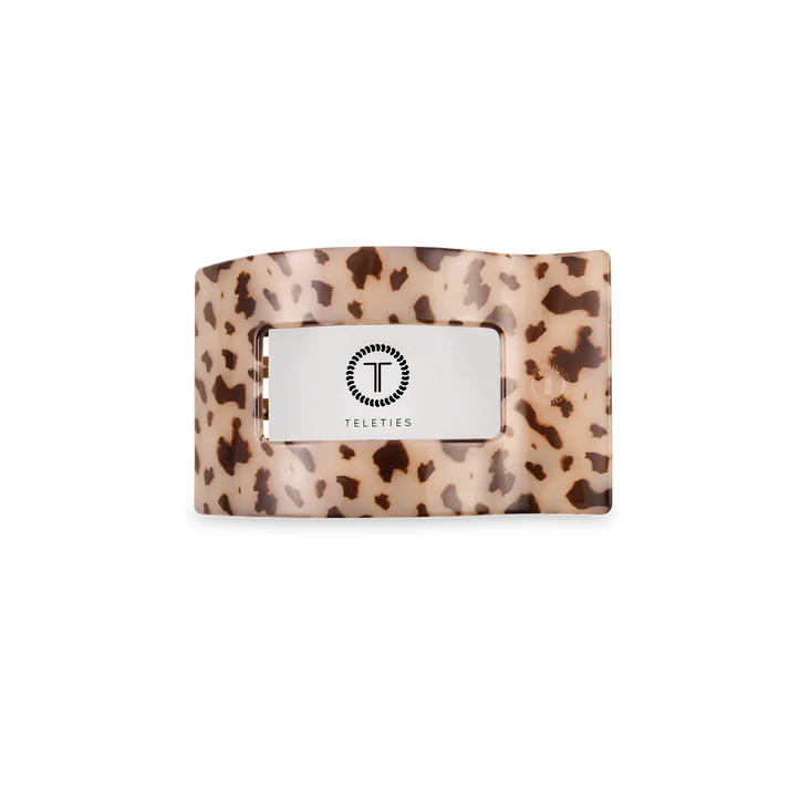 “Small flat TELETIES hair clip on white background”

“No-snag claw clip for thin to medium hair”

“Flat-back TELETIES clip perfect for driving or lounging”