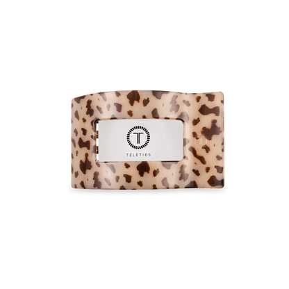 “Small flat TELETIES hair clip on white background”

“No-snag claw clip for thin to medium hair”

“Flat-back TELETIES clip perfect for driving or lounging”